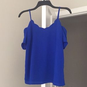 blue open shoulder shirt
